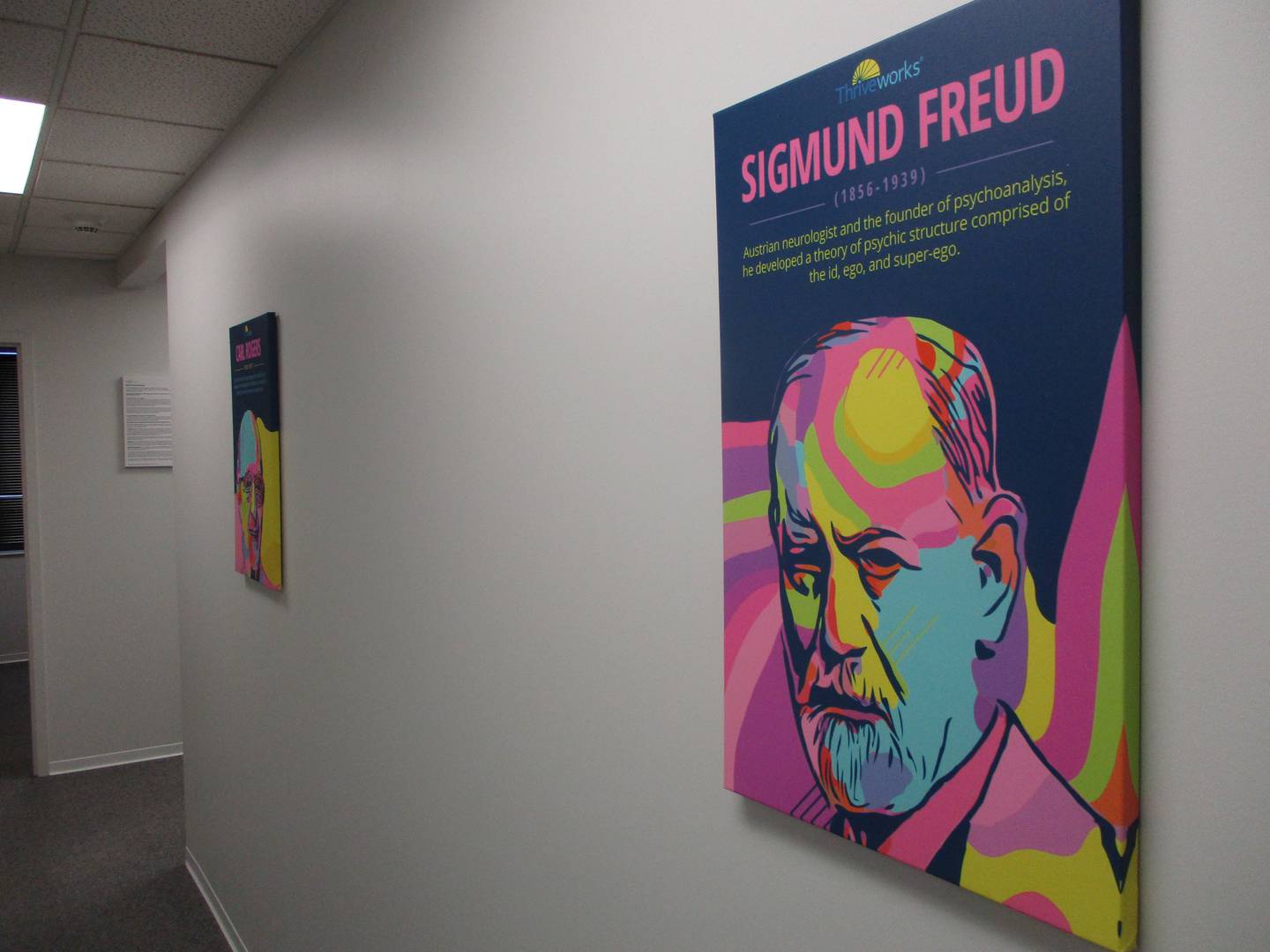 A picture depicting Sigmund Freud, hangs in a hallway at the Thriveworks clinic in Joliet on July 12, 2022.