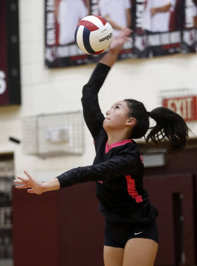 Huntley's Catherine Callahan serves the ball during a Fox Valley Conference volleyball match on Tuesday, Oct. 14, 2025, at the Prairie Ridge High School in Crystal Lake.