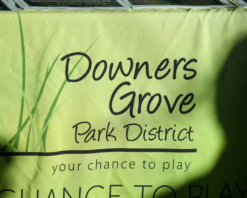 Downers Grove Park District table cover sits at the entry way of the Downers Grove recreation center with information that the recreation center on Saturday Jan. 11, 2025, during the FitFest event.