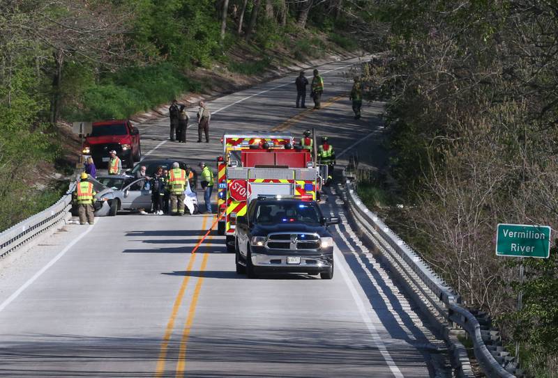 Tonica and Utica fire departments along with La Salle County Sheriff deputies, work the scene of a two-vehicle crash on the Illinois Route 178 bridge over the Vermilion River on Monday, April 22, 2024 near Lowell. The accident happened shortly before 8:30a.m. Both lanes of Illinois 178 were temporarily shut down while emergency crews assisted at the scene.