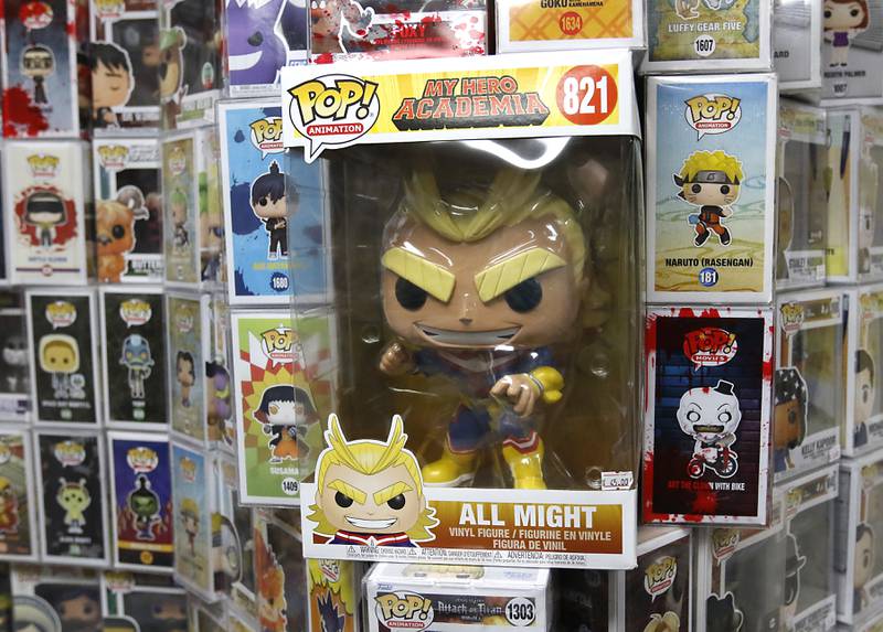 Funkos for sale on Wednesday, Feb. 5, 2025, inside the Andy’s World store in the Woodstock Square Mall. The store sells Funkos, charms for  CR0CS, metal pins, and posters.