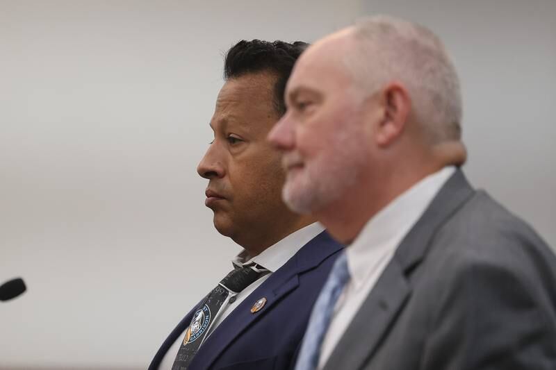 Retired Joliet police sergeant Javier Esqueda stands with his lawyer Jeff Tomczak at a pre-trial hearing at the Kendall County courthouse on Tuesday, July 9, 2024 in Yorkville. Esqueda is charged with official misconduct for accessing and leaking the police squad video of the arrest of Eric Lurry, 37, who died following his arrest on drug charges in January 2020.