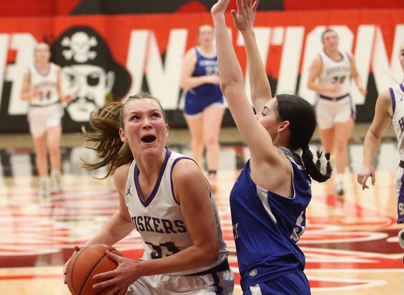 Serena's Jenna Setchell eyes the hoop as Hinckley-Big Rock's Mia Cotton defends during the Little Ten Conference championship game on Friday, Jan. 24, 2025 at Earlville High School.