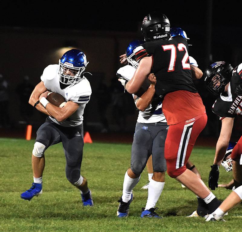 A Newman runner protects the ball during a Friday, Sept. 13, 2024 game against Erie-Prophetstown.. The Panthers fell to the Comets 41-13. suffering their first loss of the season.
