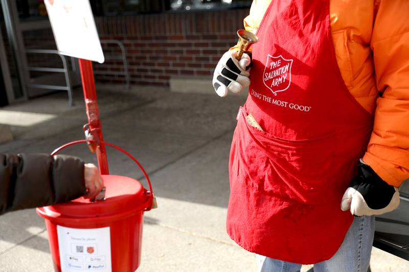 Jeff Bowgren rings the bell for the Salvation Army outside the Jewel-Osco in Batavia. A coveted gold coin was recently discovered in the kettle at that location.