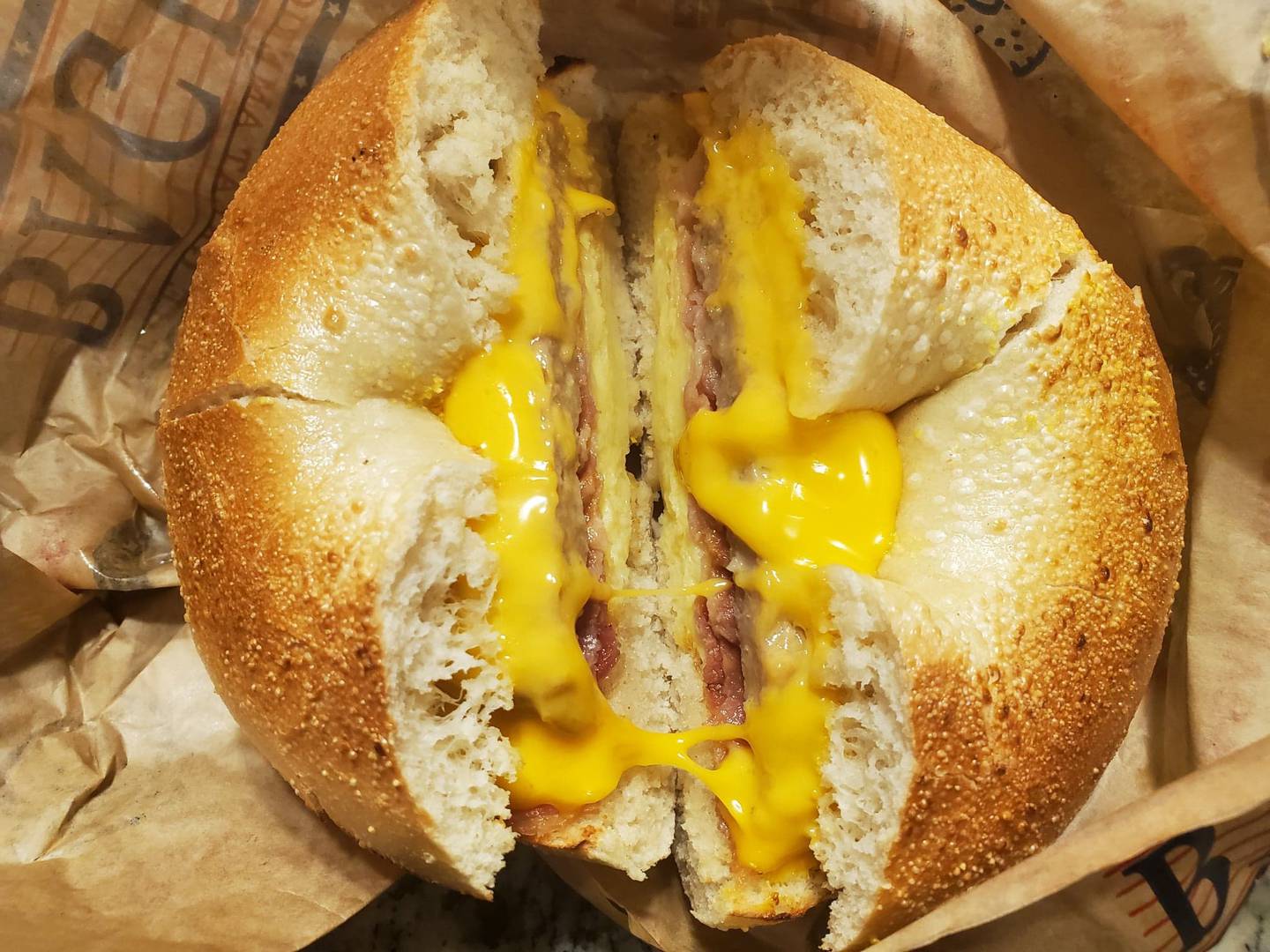 The Supreme Sunrise bagel at Great American Bagel in Joliet comes with the bagel of your choice along with sausage, egg, bacon and plenty of cheese. It makes a “filling” on-the-go sandwich.