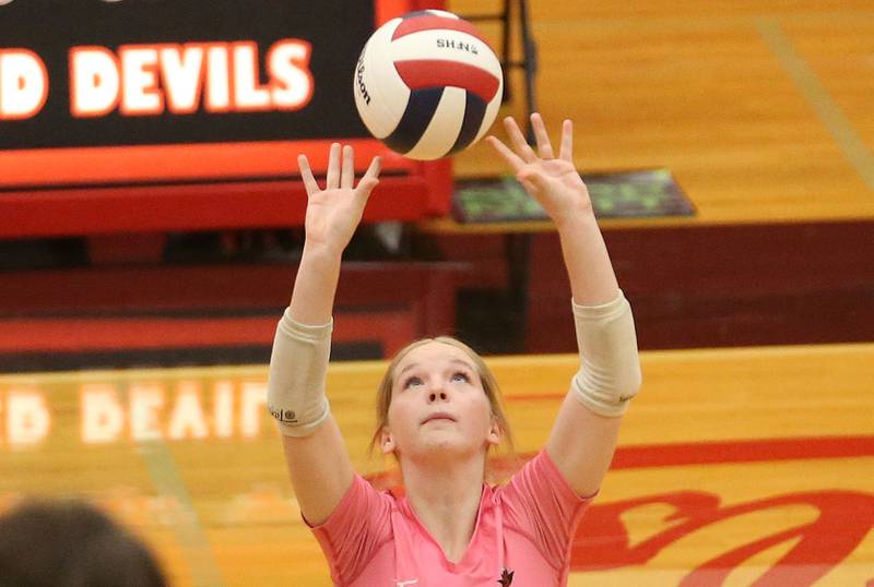 Hall's Emma McCook sets the ball in the air on Thursday, Oct. 9, 2025 at Hall High School.