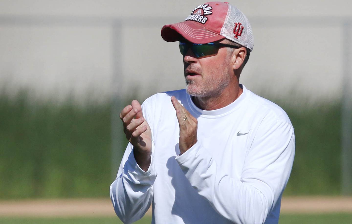 Sycamore football head coach Joe Ryan brings his team out onto the field as practice begins Monday, June 27, 2022, at the school.