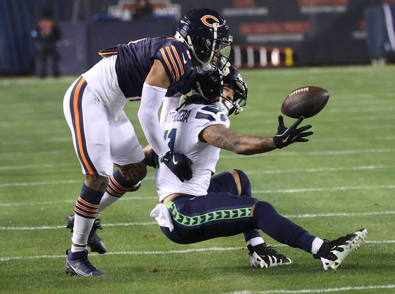Chicago Bears cornerback Kyler Gordon breaks up a pass intended for Seattle Seahawks wide receiver Jaxon Smith-Njigba during their game Sunday, Dec. 26, 2024, at Soldier Field in Chicago.