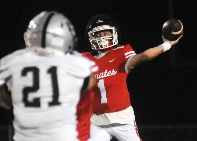 Kaneland's Jackson Little applies pressure to Ottawa's Mark Munson at King Field on Friday, Sept. 20, 2024.