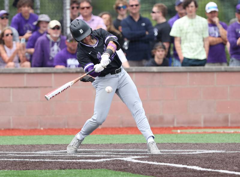 Downers Grove North's Tony Konopiots (23) makes contact during the IHSA Class 4A baseball regional final between Downers Grove North and Hinsdale Central at Bolingbrook High School on Saturday, May 27, 2023.