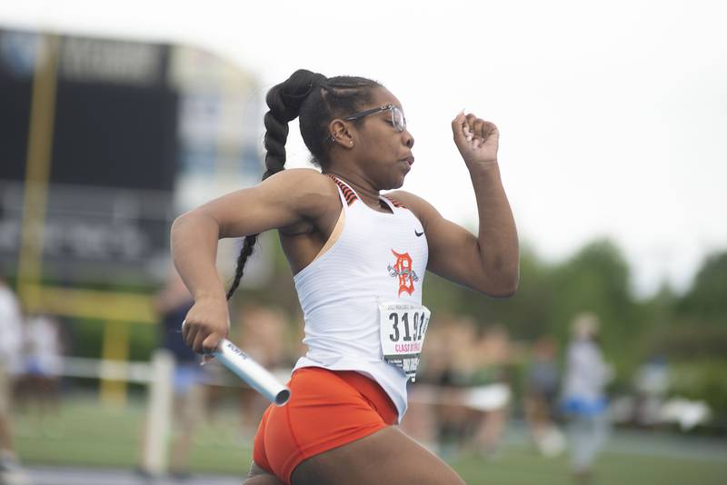 Dekalb's Mia Adeoti competes in the 4x1 finals during the IHSA girls state championships, Saturday, May 21, 2022 in Charleston.