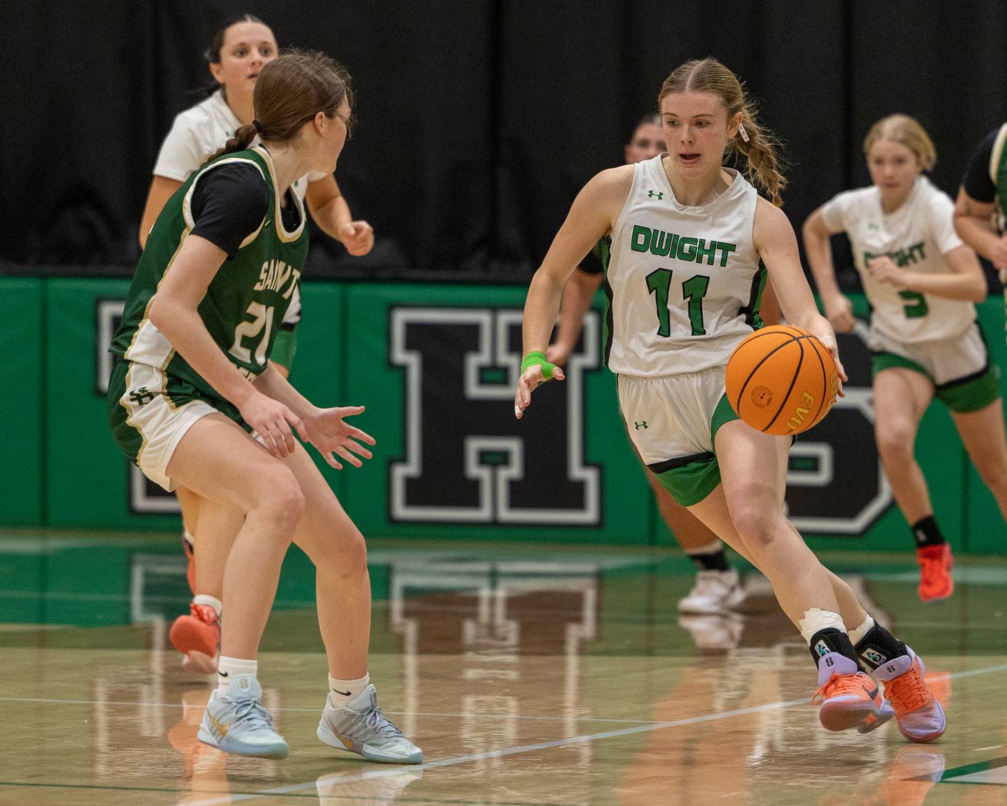 Dwight's Olivia Buck (11) dribbles ball down court whilst being guarded by Parker McClain (21) of St. Bede on Monday, January 19, 2026 at the Krese Memorial Gymnasium in Dwight.