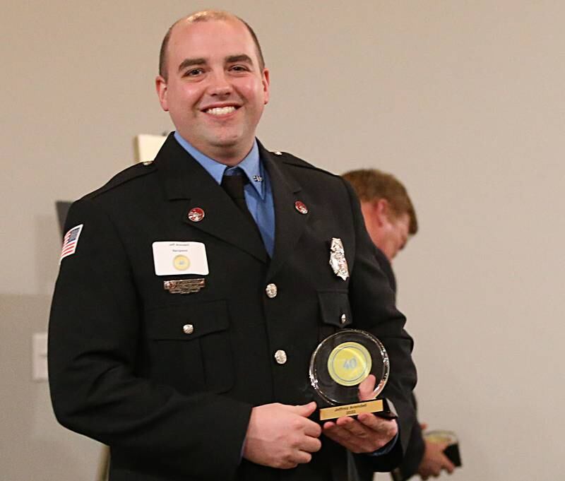 Jeffrey Arendell, Firefighter and Paramedic, Streator Fire Department poses with his award during the Illinois Valley Chamber of Commerce 40 Under Forty Awards Gala on Thursday, Feb. 9, 2023 at Westclox in Peru.
