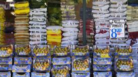 Inflation rose slightly last month as grocery prices ticked higher