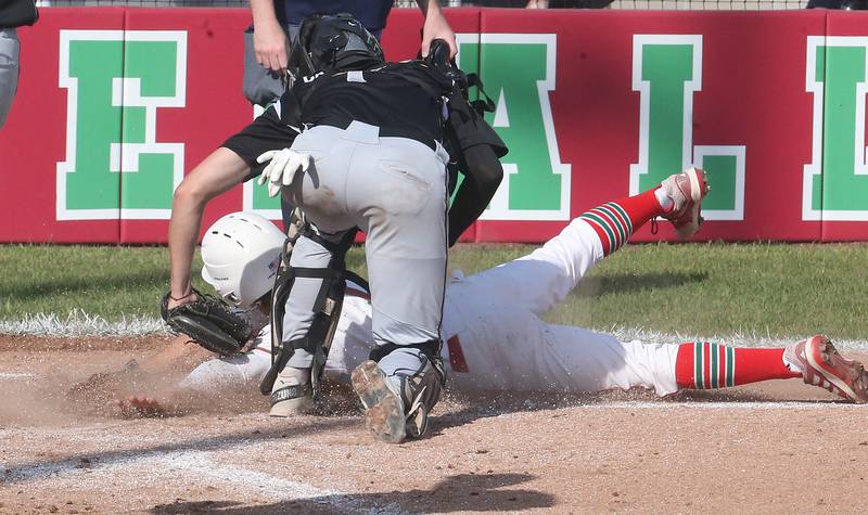 L-P's Adrian Arzola is tagged out at home plate by Kaneland catcher Nate Campbell on Tuesday, May 13, 2025 at Huby Sarver Field at the L-P Athletic Complex in La Salle.