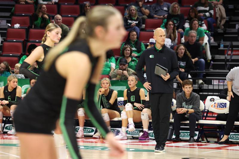 Providence head coach Lee Rucinski watches the game during Nazareth's victory in two sets, 25-16, 25-17, over Providence in the IHSA Class 3A State semifinals on Friday, Nov. 14, 2025.