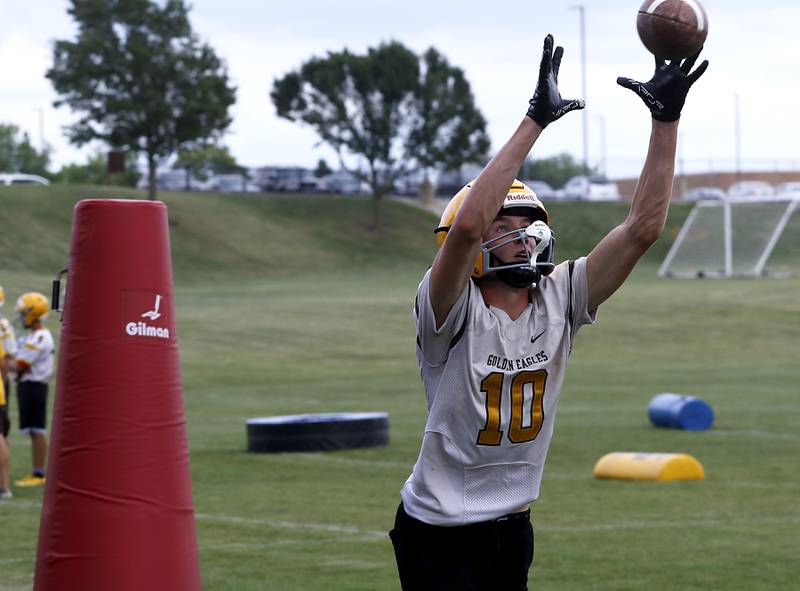Jacobs’ Carson Goehring catches a pass during football practice on Tuesday, August 15, 2025, at Jacobs High School in Algonquin.