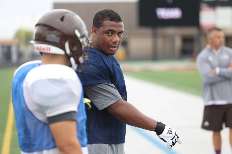 Joliet Catholic’s Dillan Johnson coaches a player on the sidelines during a scrimmage against Plainfield North on Thursday, July 13th, 2023 at Plainfield North