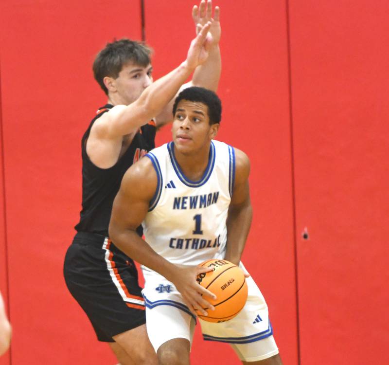 Sterling Newman's Ashton Miner (1) looks to make a move to the the basket against Milledgeville on Saturday, Dec. 13, 2025 at the 64th Annual Forreston Holiday Basketball Tournament at Forreston High School.pro