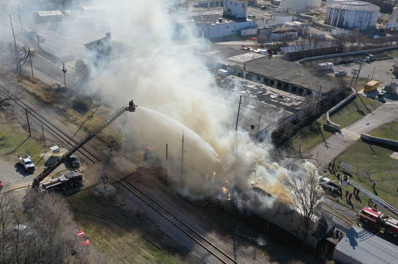Ottawa firefighters spray water on the former Platform 31 tavern on Monday, March 24, 2025 on Water Street in Peru. The fire was upgraded to a three-alarm summing ire departments from La Salle, Utica, Mendota, Tonica, Ottawa, Ladd, Spring Valley, Lostant, Cedar Point, Troy Grove and Peru responded to the fire.