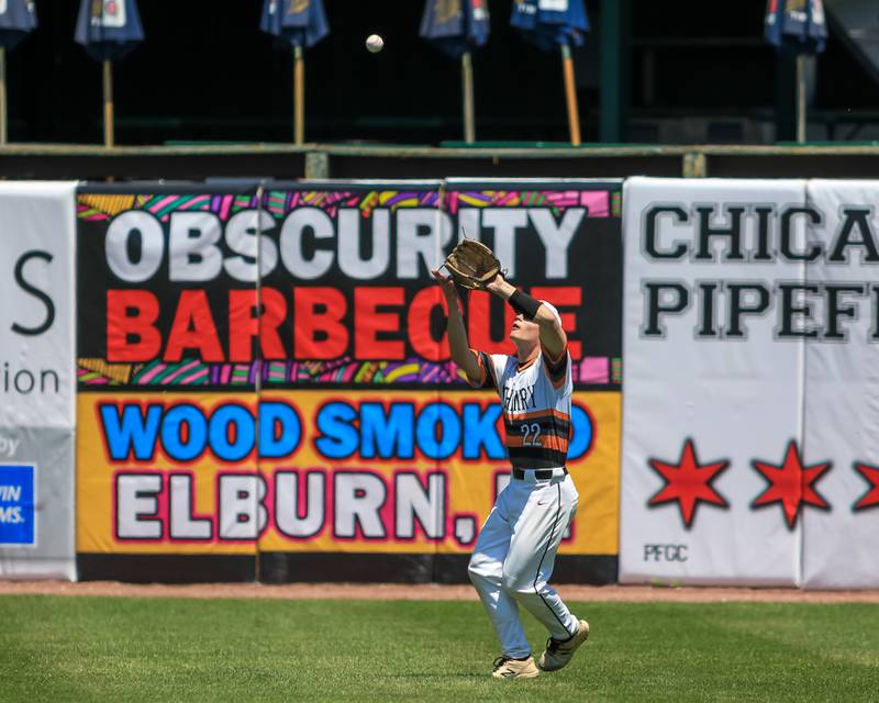 McHenry's Ricky Powell (22) makes an outfield catch during the Class 4A Supersectional game between York at McHenry.  June 7, 2022.
