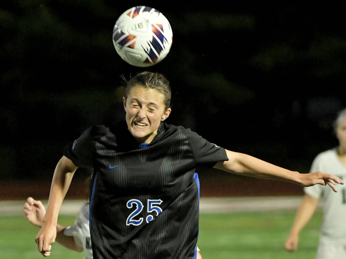 St. Charles North High School’s Kaitlin Glenn heads the ball against Winnetka New Trier High School in the IHSA Class 3A championship game at North Central College in Naperville on Saturday, June 1, 2024.