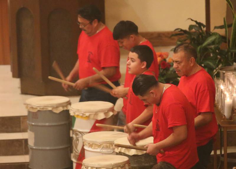 Parishioners play drums during the Lady of Guadalupe event on Tuesday, Dec. 12, 2023 at St. Hyacinth Church in La Salle. Our Lady of Guadalupe, also known as the Virgin of Guadalupe, is a Catholic title of Mary, mother of Jesus.
