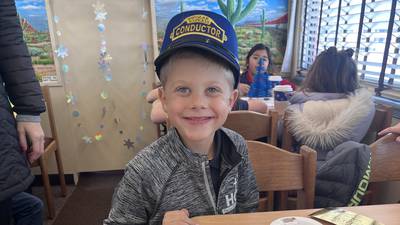 Holy Cross students ride historic Christmas train