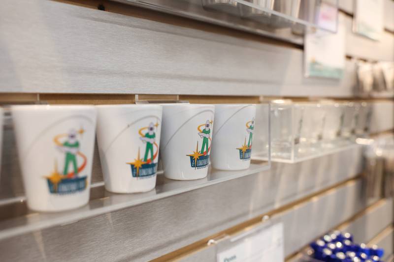 Merchandise featuring the Gemini Giant is displayed inside The Landing Pad Souvenir Shop during its grand opening at Wilmington's South Island Park on Thursday, May 22, 2025.