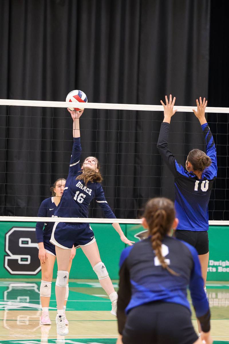 Grace Christian's Claire Rattin sends the ball over during the Crusaders' victory in two sets, 25-20, 25-16, over Clifton Centrral in the IHSA Class 1A Dwight Regional quarterfinals on Monday, Oct. 27, 2025.