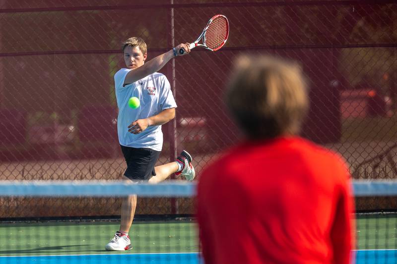 Streator's Brad Minick follows through on his return to Ottawa counterpart Landon Sawin on Monday, May 5, 2025, in Streator.
