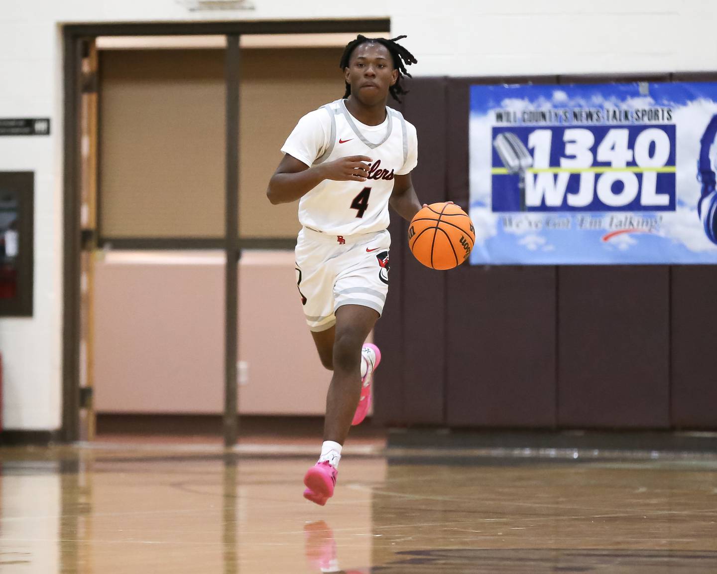 Bradley-Bourbonnais's Kobe Lawrence (4) races down court during their WJOL Thanksgiving Classic Championship game between Bradley Bourbonnais at Lemont, Saturday November 30, 2024  in Joliet.