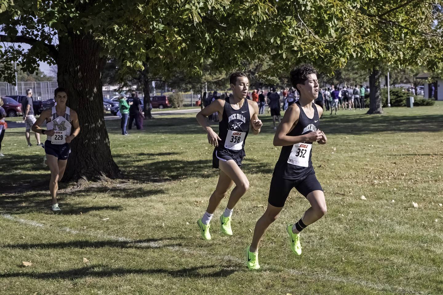 Rock Falls' Jose Gomez (right) and Anthony Valdivia run aty the 1A Rock Falls Reghional on Saturday morning at Centennial Park. Gomez finished fourth and Valdivia placed sixth to lead the Rockets to third place as a team.
