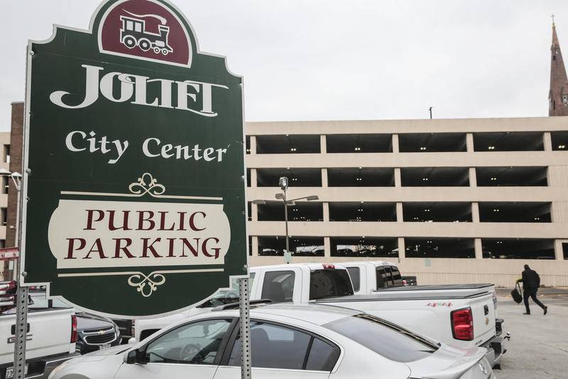 A Public Parking sign can be seen along Chicago Street in Joliet, Ill.