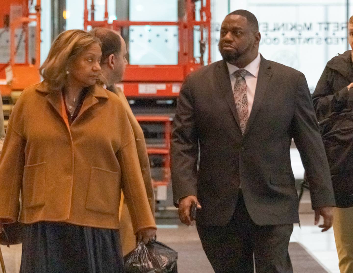 State Sen. Emil Jones III and his stepmother Lori leave the Dirksen Federal Courthouse on April 17, 2025, after leaving the witness stand for a final time in his corruption trial.