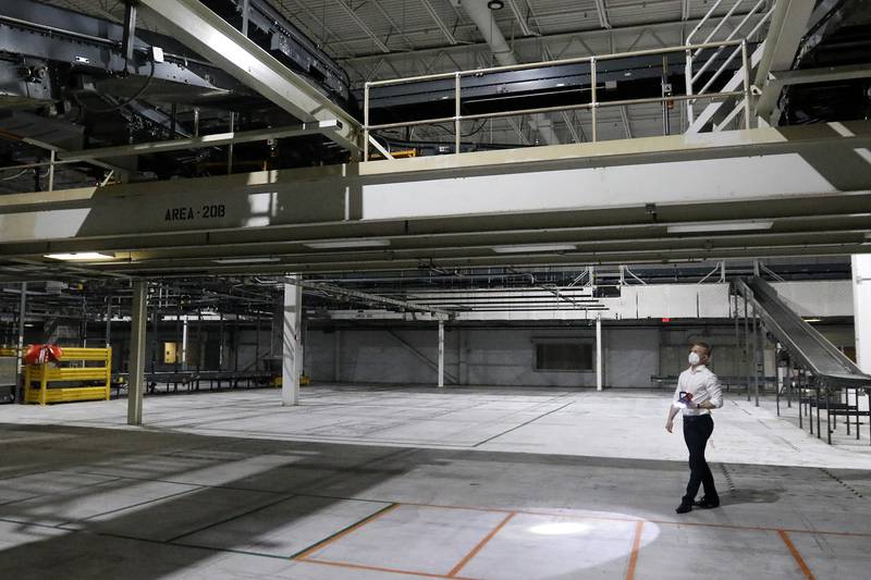 Sean Stofer, COO of Green Data Center Real Estate, Inc., shows a manufacturing and packing area inside the property at the former Motorola headquarters on Thursday, June 10, 2021 in Harvard.