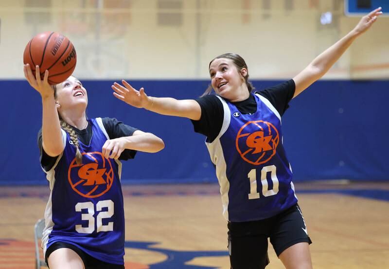Genoa-Kingston’s Ally Poegel shoots a layup Wednesday, June 26, 2024, during summer practice at the school.