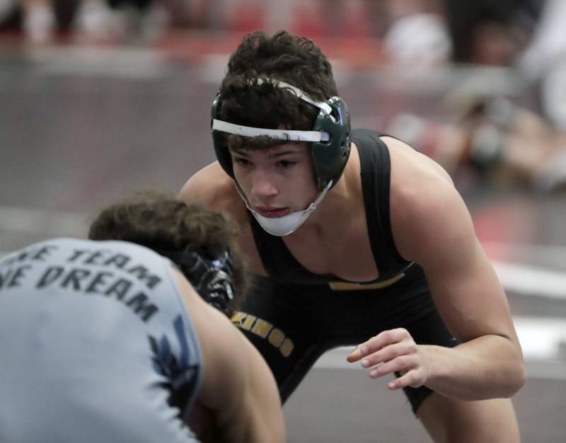 Belvidere's Kamryn Labeau wrestleÕs Fremd's Maddox Khalimsky at 132-pounds during the IHSA 3A Individual Sectional wrestling meet at Barrington High School Saturday February 12, 2022.