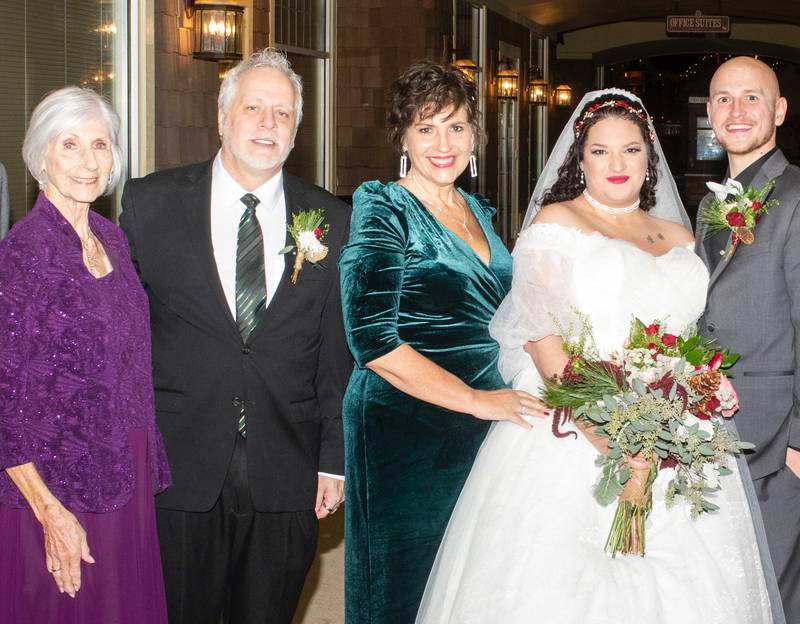 After having a heart valve replaced in a clinical trial, Barbara Schneider, 87, returned to volunteering at Northwestern Medicine Delnor Hospital in Geneva. She went on to participate in three granddaughters' weddings in 2023, the last in Geneva. From left, Schneider, Rich and Kristin Balsitis, Gabrielle and Matthew Sowinski.
