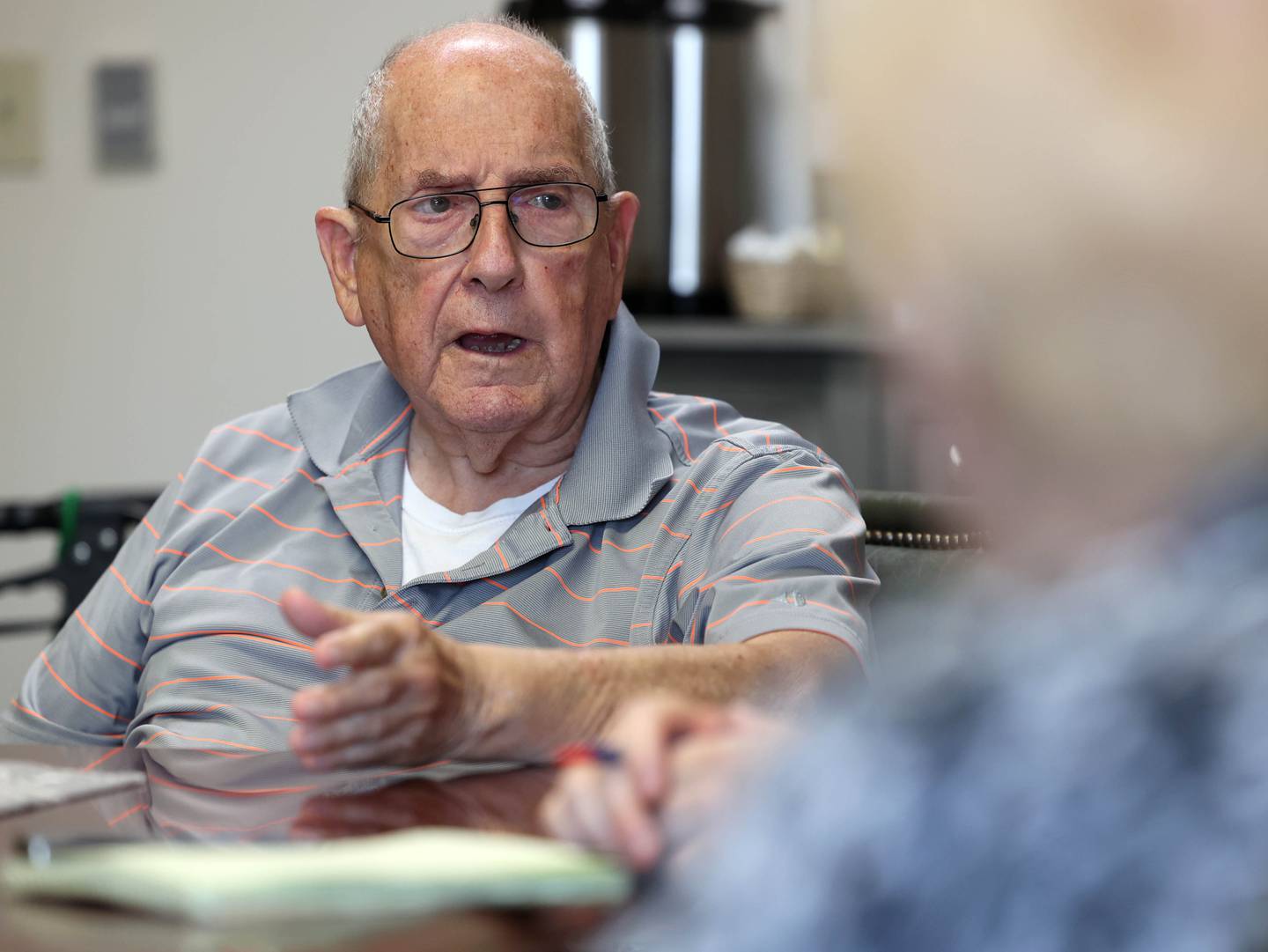 Gerald Wagner, 85, a resident of Heritage Woods of DeKalb, gives his thoughts on Medicaid Monday, July 14, 2025, during a discussion at the assisted living facility.
