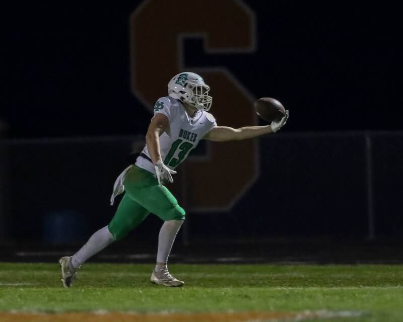 York's Jack Bimbaum (13) makes a catch during Class 8A second- round football game between York at Oswego on Friday, Nov 8, 2024  in Oswego.