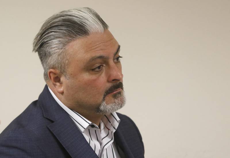 McHenry County sheriff candidate Tony Colatorti listens to proceedings during a hearing of McHenry County Electoral Board on Monday, March 28, 2022, at the McHenry County Administration Building in Woodstock. The hearing is the result of an objection filed the week prior by William Brogan and Joel Brumlik disputing Tony Colatorti's qualifications to run for the position of McHenry County sheriff.