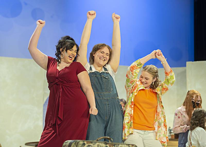 Tanya, Donna and Rosie, who are played by Leslie Pettorini, Jenna Cibu and Abby Tate, respectively act out a scene in Dixon High School’s dress rehearsal of “Mamma Mia” on Wednesday.