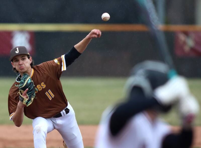 Jacobs’ Aiden Stumpf makes an offering against Prairie Ridge in varsity baseball on Wednesday, April 9, 2025, at Prairie Ridge High School in Crystal Lake.