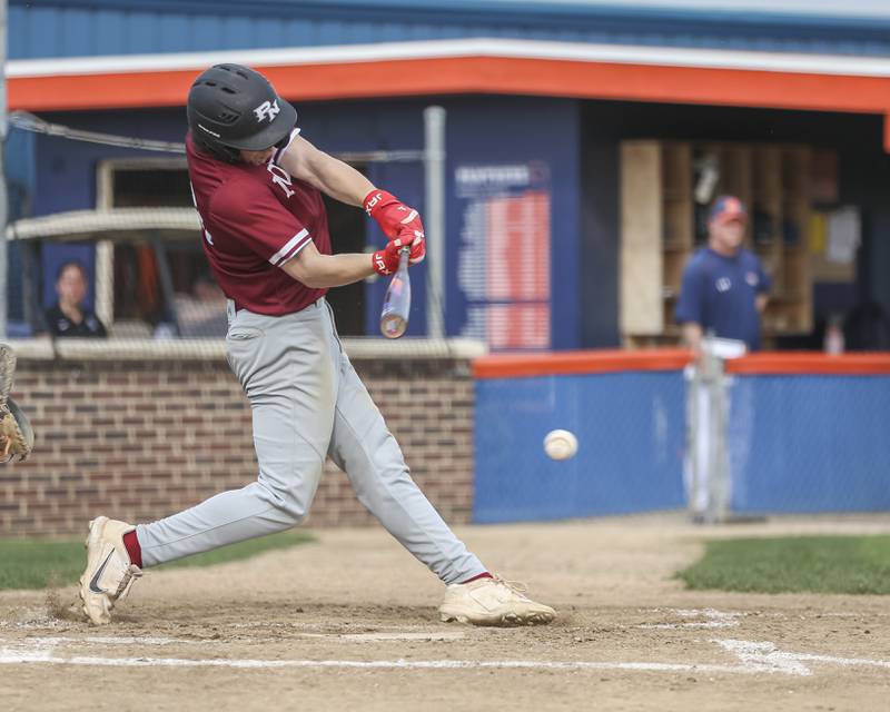 Plainfield North's Brendan Henderson (10) connects on a pitch during baseball game between Plainfield North at Oswego, Thursday, April 24, 2025 in Oswego.