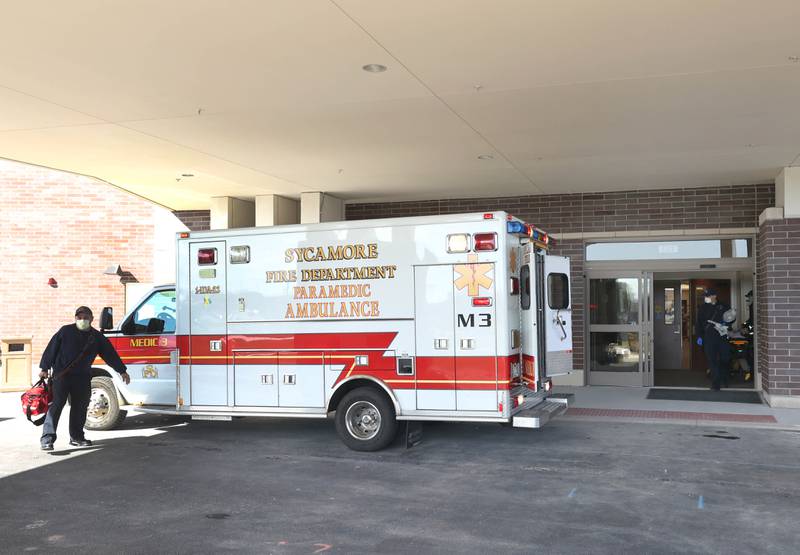 A Sycamore Fire Department ambulance pulls up to the new entryway to the emergency room Monday, March 28, 2022, at Northwestern Medicine Kishwaukee Hospital. The second phase of the three-phase renovation project was recently completed in the ER at the facility.