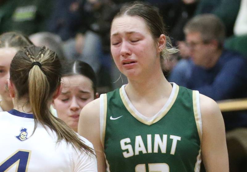 St. Bede's Ashlyn Ehm reacts after loosing to Marquette during the Class 1A Regional semifinal game on Tuesday, Feb. 18, 2025 at St. Bede Academy.