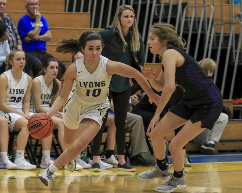 Lyons Township's Lindsey Hahn (10) drives to the basket during basketball game between Downers Grove North at Lyons Township.  Jan 14 2020.  Gary E Duncan Sr for Shaw Media.