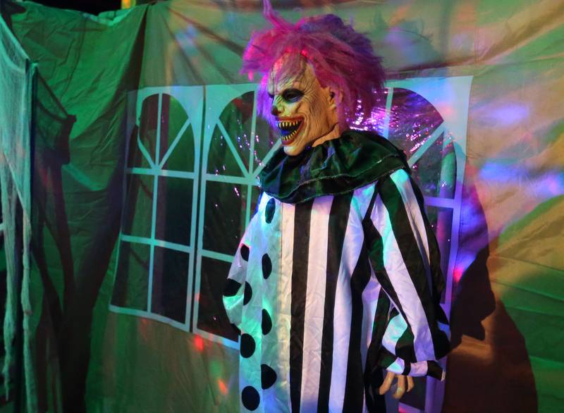 A scary clown scares visitors at the Nightmare Haunted Attraction on Saturday, Oct. 14, 2023 at the Bureau County Fairgrounds in Princeton.